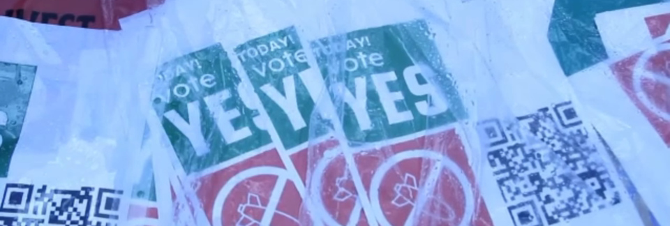 Photo of a stack of leaflets that read: Today! Vote Yes.